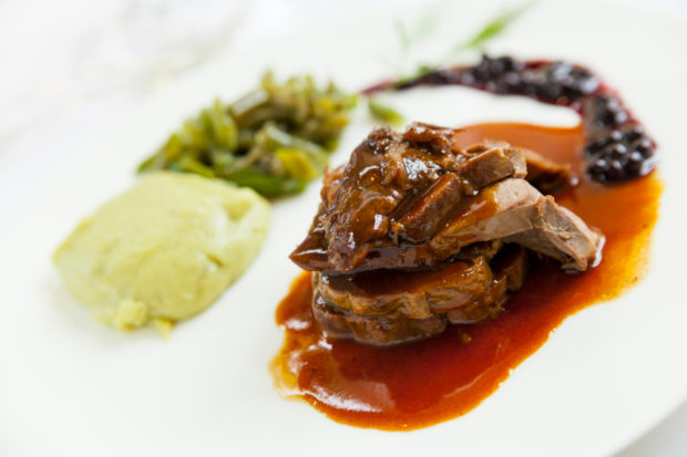 delicious gourmet deer course with sauce